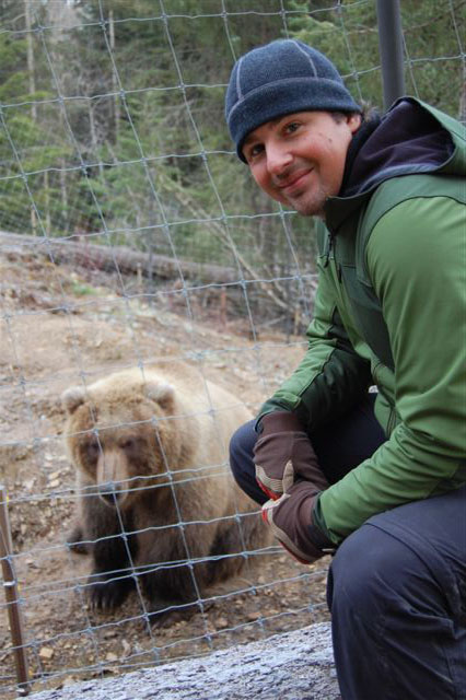 Casey Anderson, host of National Geographic’s “Expedition Wild”, visits “Kitty the Grizzly” at the Kroschel’s